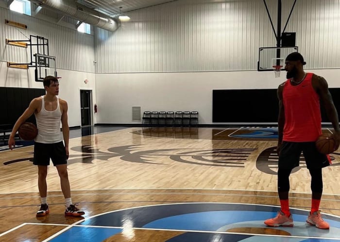 Gabe Cupps (left) and Lebron James (right) work out together at The Island Performance Center in Cuyahoga Falls, Ohio on July 3, 2022.